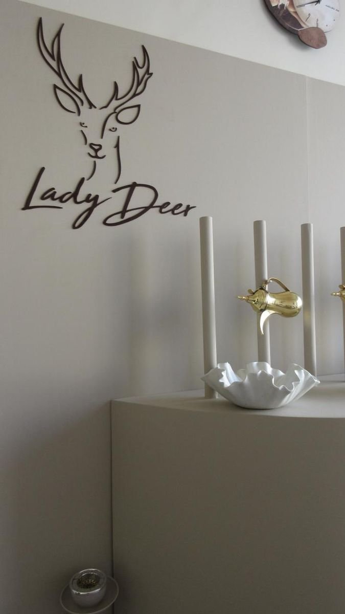 Lady Deer wall emblem
